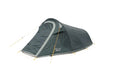 The Vango Soul 100 is a small, dark green waterproof 1-man tent with yellow guy lines and stakes, set up on a white background. It features a single entrance and has "SOUL 100" labeled on the side.
